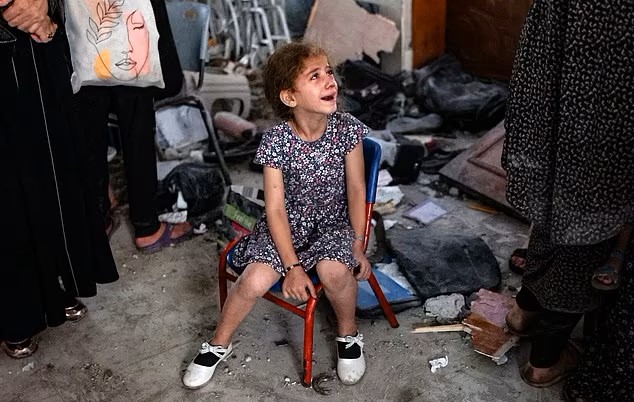 Gazan child mours amidst devastation