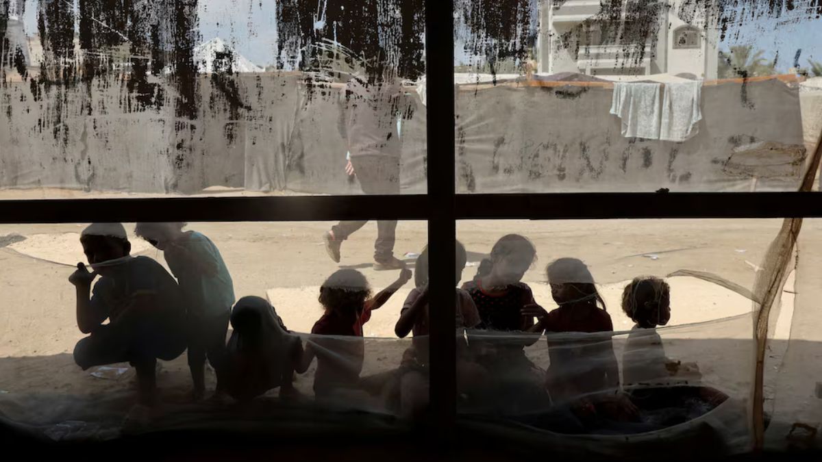 Children being tested for polio outside a hospital in Gaza