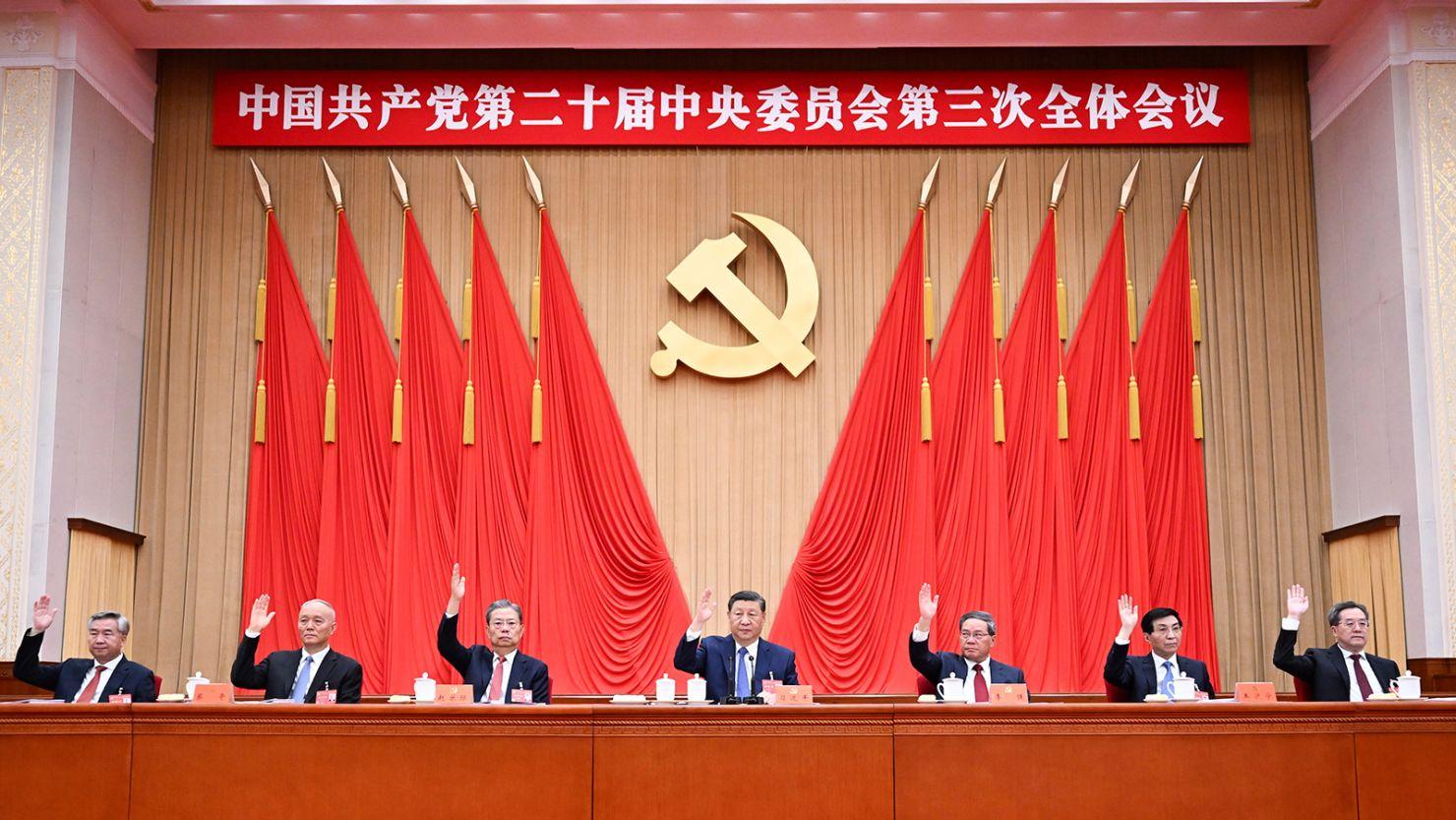 Politburo Standing Committee members, including Chinese leader Xi Jinping (center), attend the third plenary session of the 20th Communist Party of China Central Committee, in Beijing on July 18, 2024.