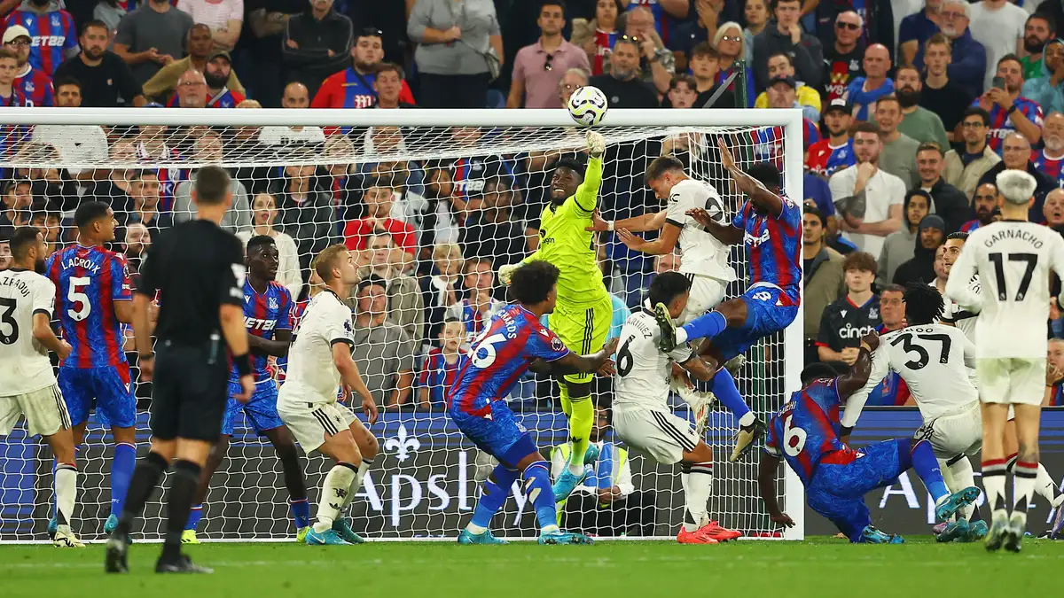 Manchester United's André Onana saving the shot against Crystal Palace in Premier League 2024-25.