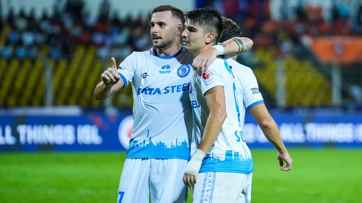 Jamshedpur's Javier Siverio and Jordan Murray celebrates their win over FC Goa in ISL