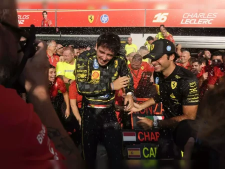 Charles Leclerc and his teammate celebrating his win