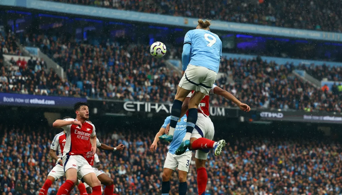 Premier League 2024-25: Erling Haaland attempts to score against Arsenal.