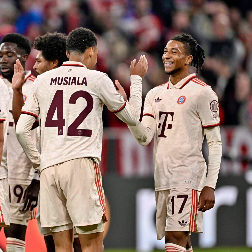 Bayern's Michael Olise celebrating with Jamal Musiala in UCL win against Dinamo Zagreb