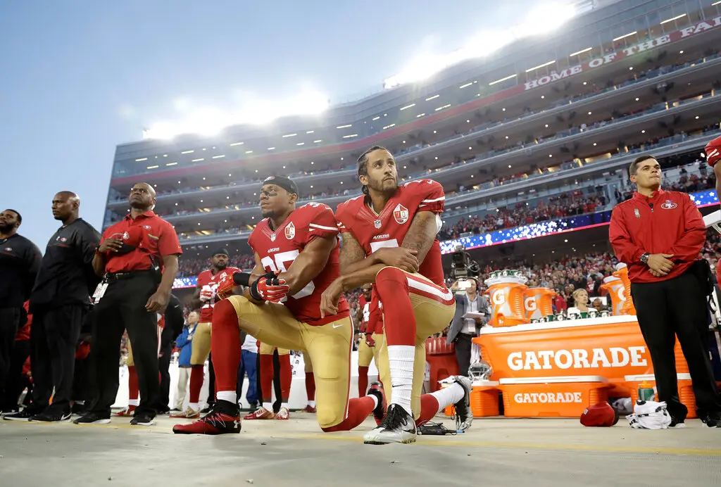 Mr. Goodell also faced criticism when players like Colin Kaepernick, second from right, began to kneel during the playing of the national anthem as a form of protest.