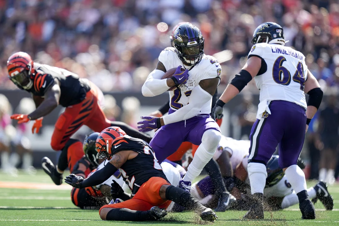 Henry's 51-yard run in overtime set up the game-winning kick against the Bengals in NFL