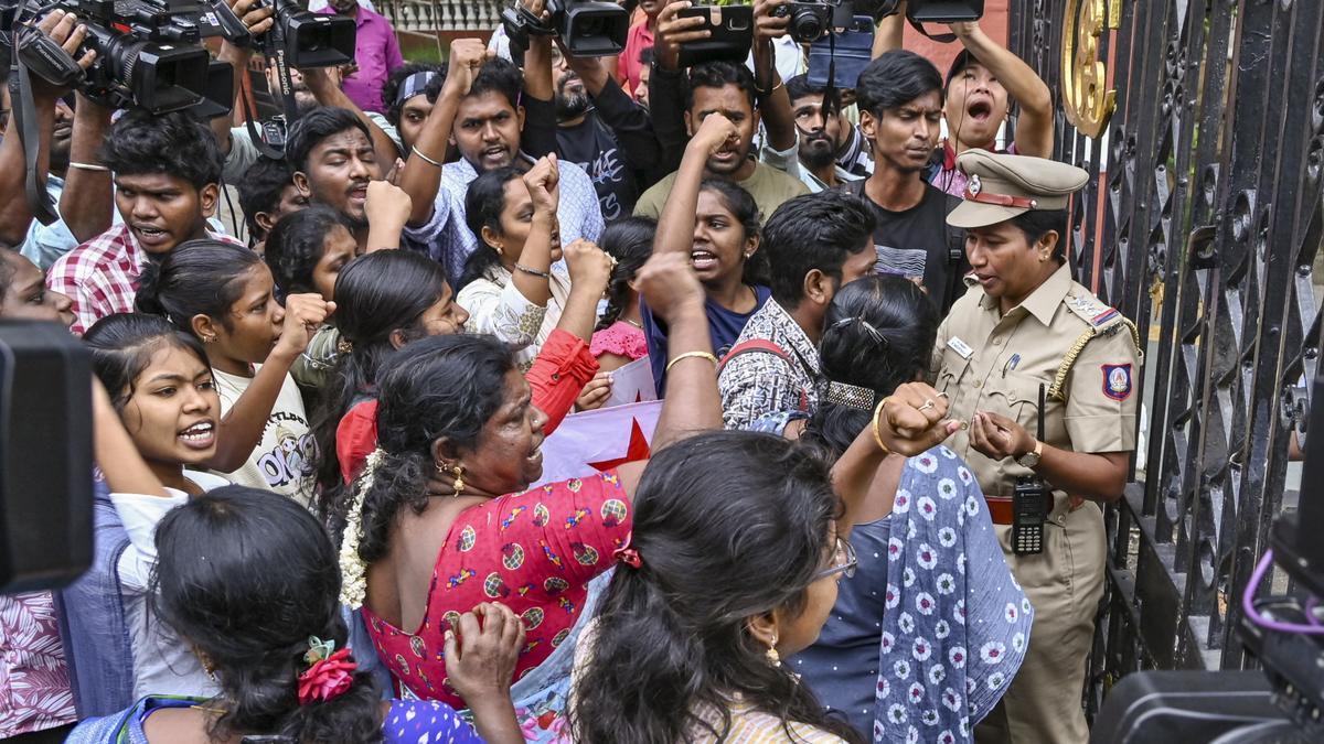 protesters outside Anna University gate 